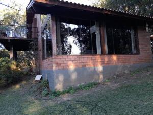 Casinha da Serra com açude