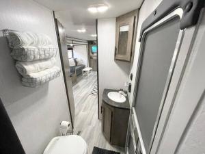 RV located on private property, providing access to the Guadalupe River, accommodates up to 5 guests