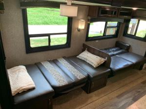 RV located on private property, providing access to the Guadalupe River, accommodates up to 7 guests