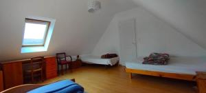 Maisons de vacances CARANTEC MAISON FAMILIALE AVEC JARDIN 9 personnes : photos des chambres