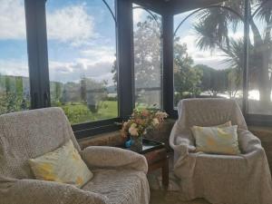 Maisons de vacances Kermartin - Maison de famille avec vue sur la baie de Morlaix : photos des chambres