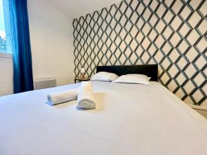 Appartements Le Guillaumin, convivial et zen : photos des chambres