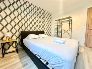 Appartements Le Guillaumin, convivial et zen : photos des chambres