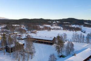 Ljusnedal lägenhet med golf, paddel, fiske och skidåkning