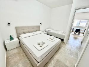 Il Villino Porto Cesareo - Alloggio con posto auto