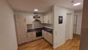 Marta City Apartment - barrierefrei, zentral, mit Balkon & Parkplatz