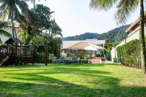 Paraíso Pé na Areia para 24 hóspedes com colaborador