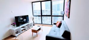 Stylish High-Rise Escape Pool, Hot Tub & Cinema