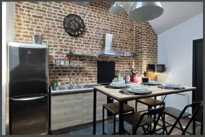 Appartements Le 201 Bis : photos des chambres
