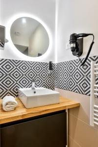 Appartements Le Chic & Biscornu - Terrasse - Clim - Centre Ville : photos des chambres