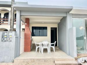 Pé na areia! Aconchegante casa frente Mar! CO02I