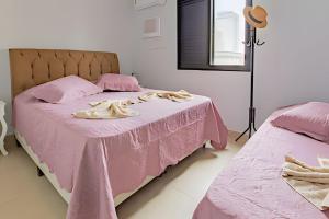 Apt 2 quartos, piscina. garagem, churrasqueira, ar e 2 WC