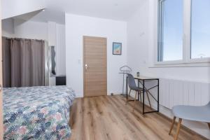 Appartements LE REFUGE PYRENEEN - Climatisation Parking WIFi Espace de Travail - NEUF- Tres belle Vue sur les Pyrenees - 2 lits - OFFRE SPECIALE : photos des chambres