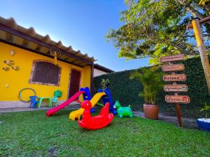 Recantos Pinheiros - Casa inteira, até 15 hóspedes - Piscina privativa, sinuca, ar condicionado e TVs nos 4 quartos - Condomínio Orla 500, lado praia - Unamar, Cabo Frio-RJ