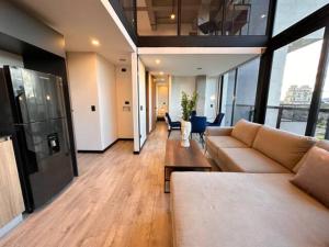 Skyline Suites - Elegant Living with Coworking & Scenic Views