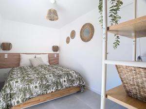 Appartements Le Romarin Bas de villa T2 avec jardin et parking au pied de la Foret : photos des chambres