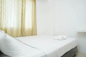 Comfy and Furnished 2BR Bassura City Apartment near Mall By Travelio