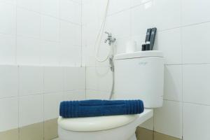 Comfy and Furnished 2BR Bassura City Apartment near Mall By Travelio