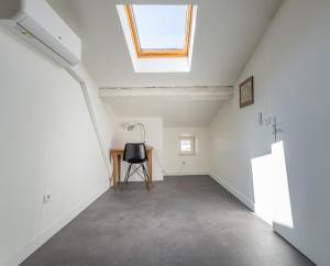 Appartements Duplex proche bord de Saone : photos des chambres
