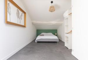 Appartements Duplex proche bord de Saone : photos des chambres