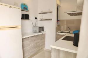 Lovely 1BR home with private balcony in St Julians by 360 Estates