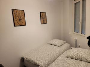 Appartements Charmant appartement en coeur de ville : photos des chambres
