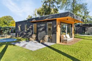 Lodge de Vos - Luxe Lodge op de Veluwe met vrij uitzicht & omheinde tuin