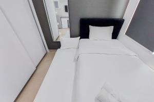 Cozy Style and Comfort Studio Room Apartment at B Residence By Travelio