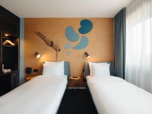 Eco-friendly Triple Room  room in Conscious Hotel The Tire Station