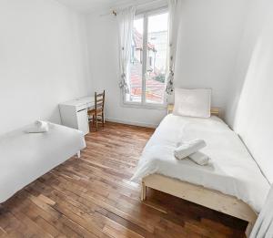 Maisons de vacances Grande Maison Lumineuse a 10km de Paris : photos des chambres