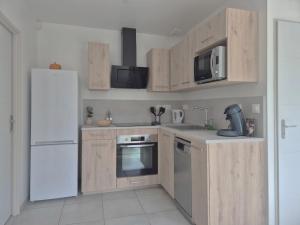 Maisons de vacances Ticya Lodge 10 minutes Parc Disneyland Maison neuve independante jusqu-a 5 voyageurs lit bebe 2 places Parking Ferme : photos des chambres
