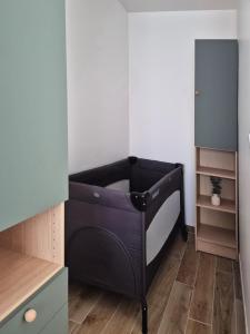 Maisons de vacances Ticya Lodge 10 minutes Parc Disneyland Maison neuve independante jusqu-a 5 voyageurs lit bebe 2 places Parking Ferme : photos des chambres