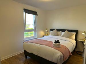 Cozy 2 bedrooms with private parking space and garden