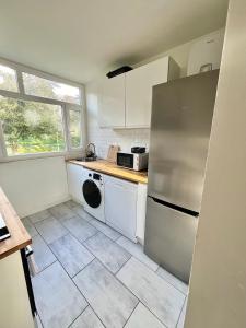 Haven Park - Appartement entier spacieux de 4 chambres 10 min RER D, 35 min de Paris, NETFLIX, FIBRE OPTIQUE, PLACE DE PARKING