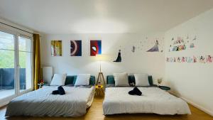 Appartements Mickey Mouse - Gare - Centre - Lac - Parking - Wifi : photos des chambres