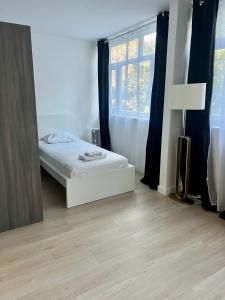 Haven Park - Appartement entier spacieux de 4 chambres 10 min RER D, 35 min de Paris, NETFLIX, FIBRE OPTIQUE, PLACE DE PARKING