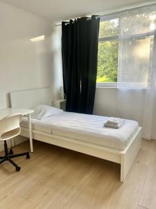Haven Park - Appartement entier spacieux de 4 chambres 10 min RER D, 35 min de Paris, NETFLIX, FIBRE OPTIQUE, PLACE DE PARKING