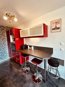 Appartements Duplex Le G - proche Disneyland : photos des chambres