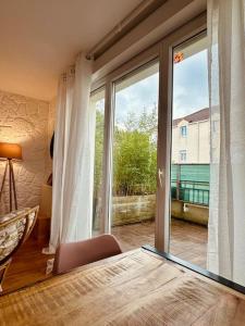 Appartements Duplex Le G - proche Disneyland : photos des chambres