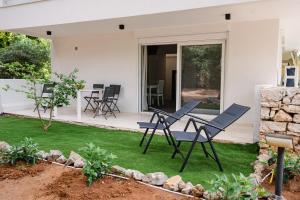 Aspa Luxury Garden Apartment in Vouliagmeni Center