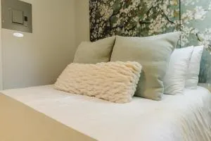 Centrally Located Memphis Tiny Home Queen Bed REAR - Aulon