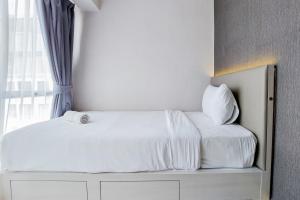 Great Deal 2BR Apartment at M-Town Residence near SMS Mall By Travelio