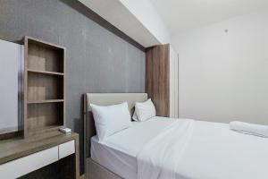 Great Deal 2BR Apartment at M-Town Residence near SMS Mall By Travelio