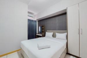 Great Deal 2BR Apartment at M-Town Residence near SMS Mall By Travelio