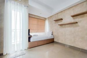 Cozy Stay Studio Room Apartment at B Residence By Travelio