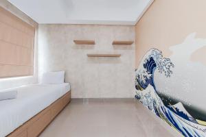 Cozy Stay Studio Room Apartment at B Residence By Travelio