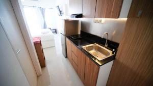 Nice and Comfy Studio at Orchard Supermall Mansion Apartment By Travelio