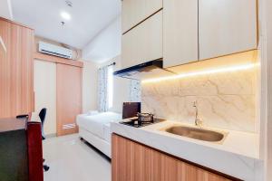 Homey and Simply Look Studio Room Apartment B Residence By Travelio