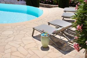 Maisons de vacances Villa La Genestiere - Familienoase und Golfertraum mit Infinity-Pool und 180-Grad-Panoramablick bis zum Meer : photos des chambres