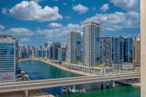 Manzil - 2BHK Apt in Business Bay with Iconic Burj Khalifa and Dubai Canal Views